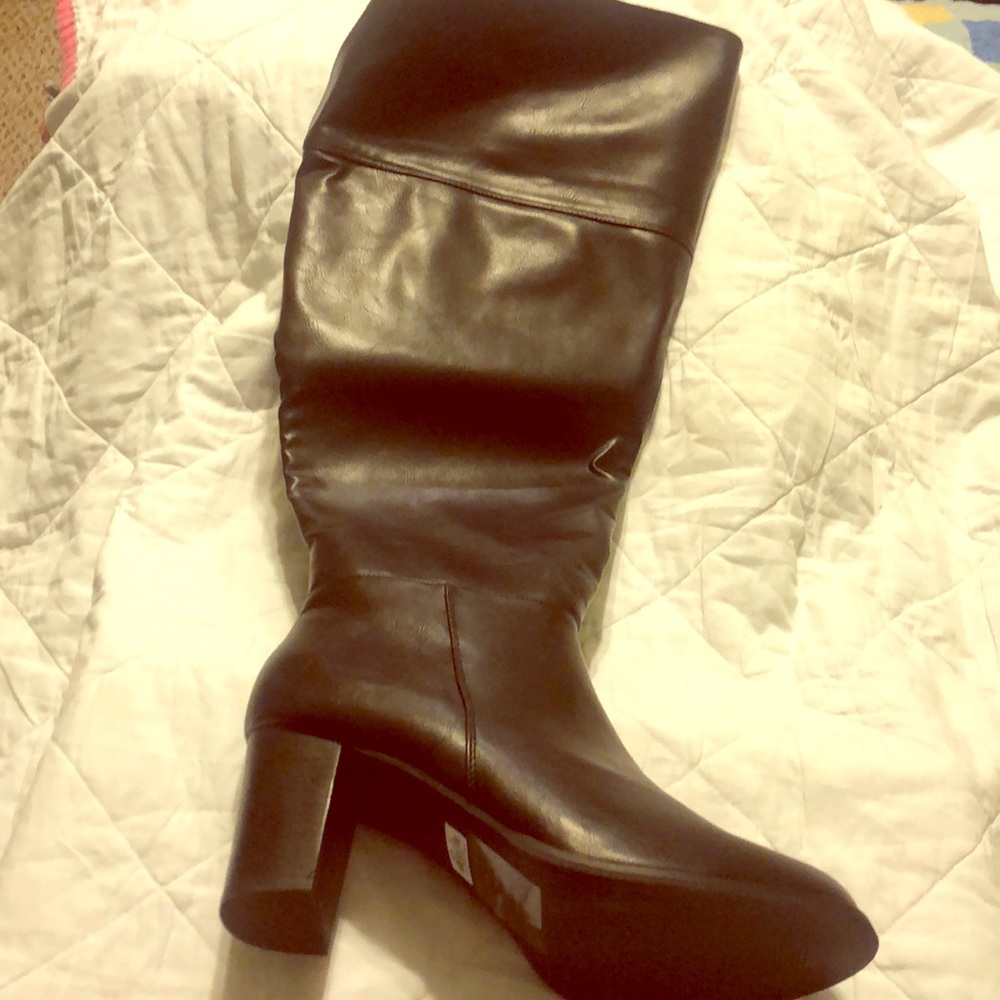 New In box Torrid Black side zip boots